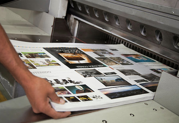 Printed sheets being checked at a cutter